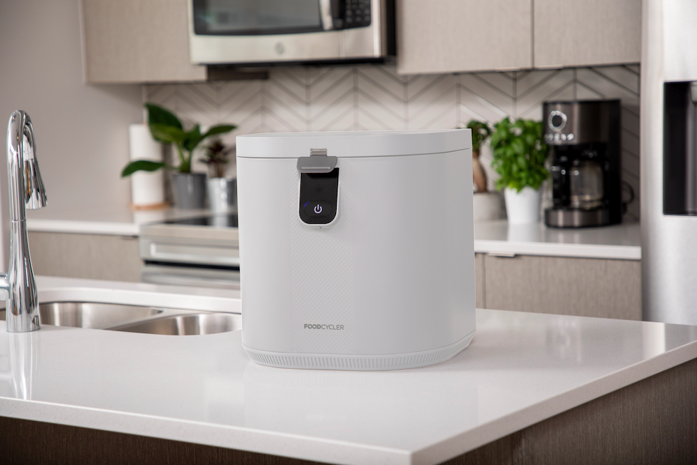 FoodCycler Eco 5 - White | on a kitchen island next to a sink